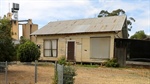 Country town's block selling with a 'free house'